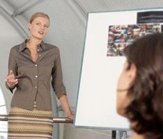 photo of a lady giving a presentation