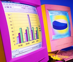 photo of computer screens with 3d graphs