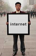 Chinese Man holding Internet Sign