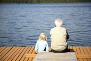 grandpa-and child by water
