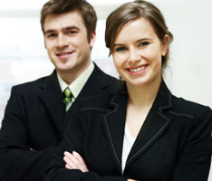 two smartly dressed business people